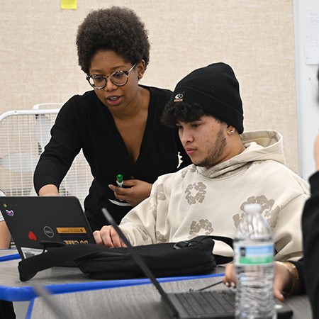 Teacher and student working together