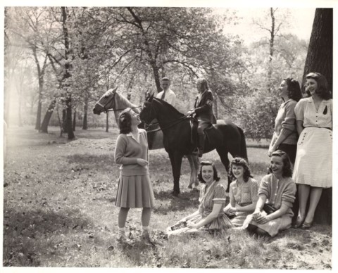 Women on campus with horses