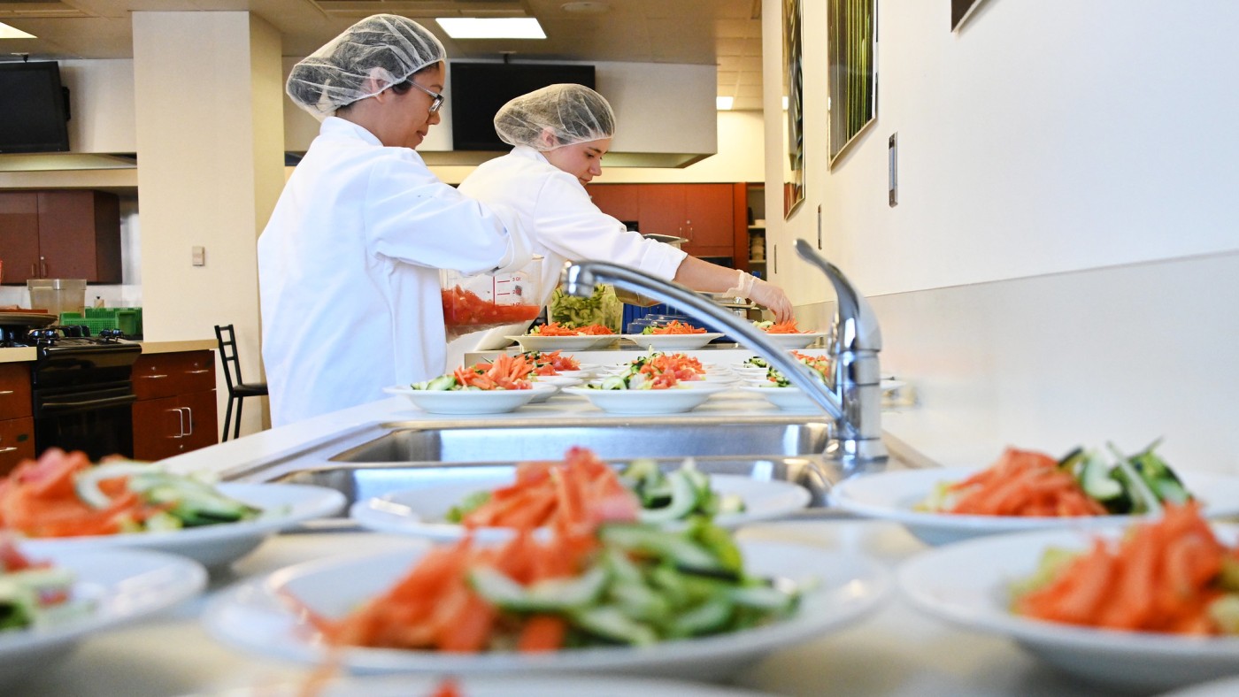 Dining staff at the prep table