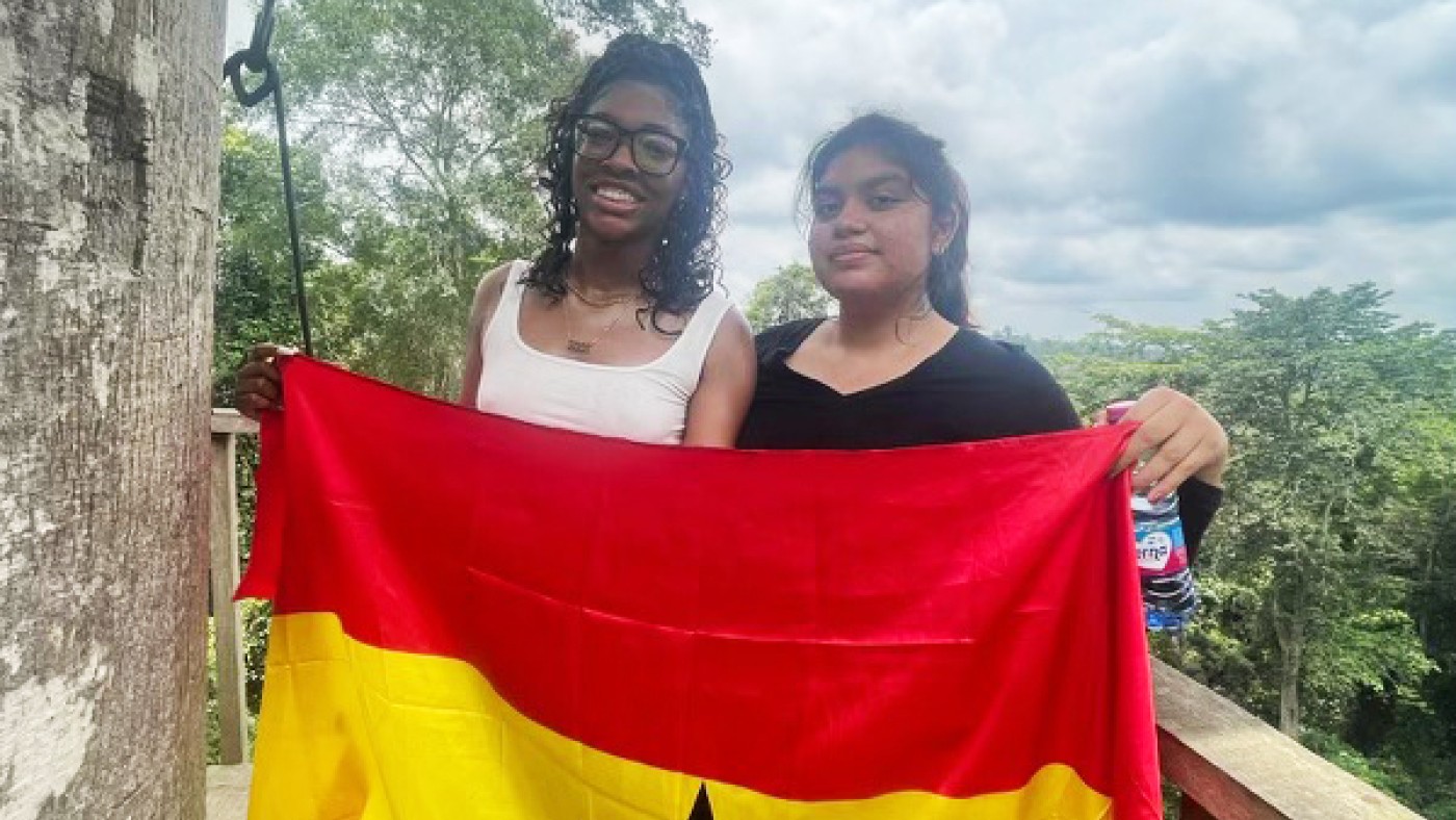 Two students with Ghana flag