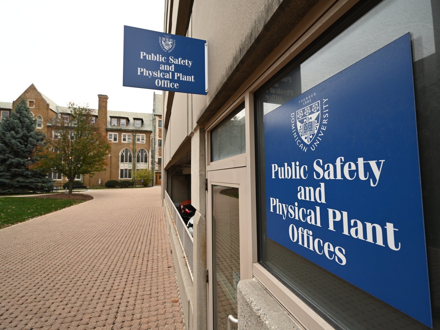 Campus safety signage on building