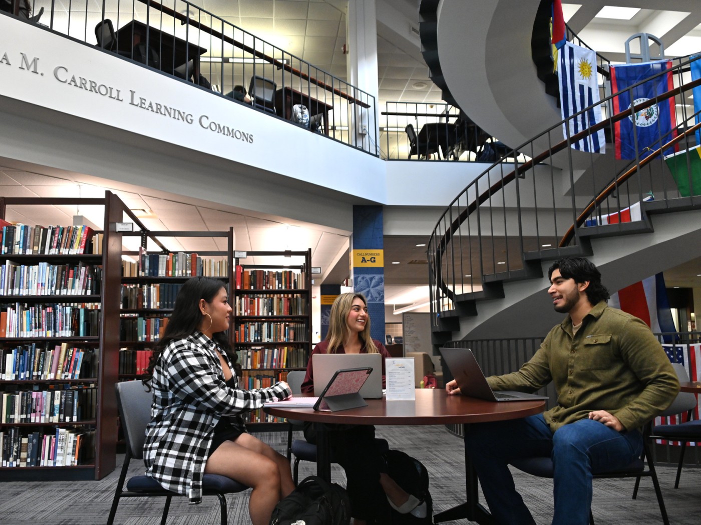 Students at a table in the library