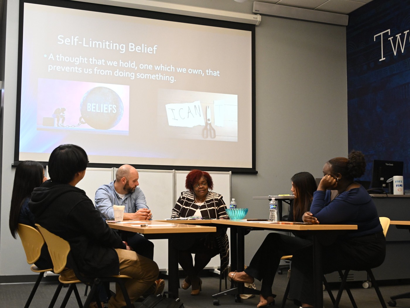 Individuals gathered around a table