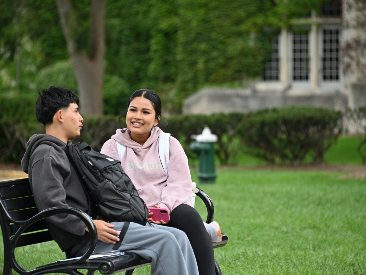 Couple sitting on campus
