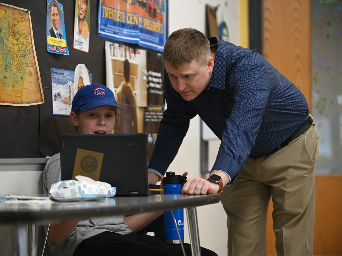 Teacher with young student