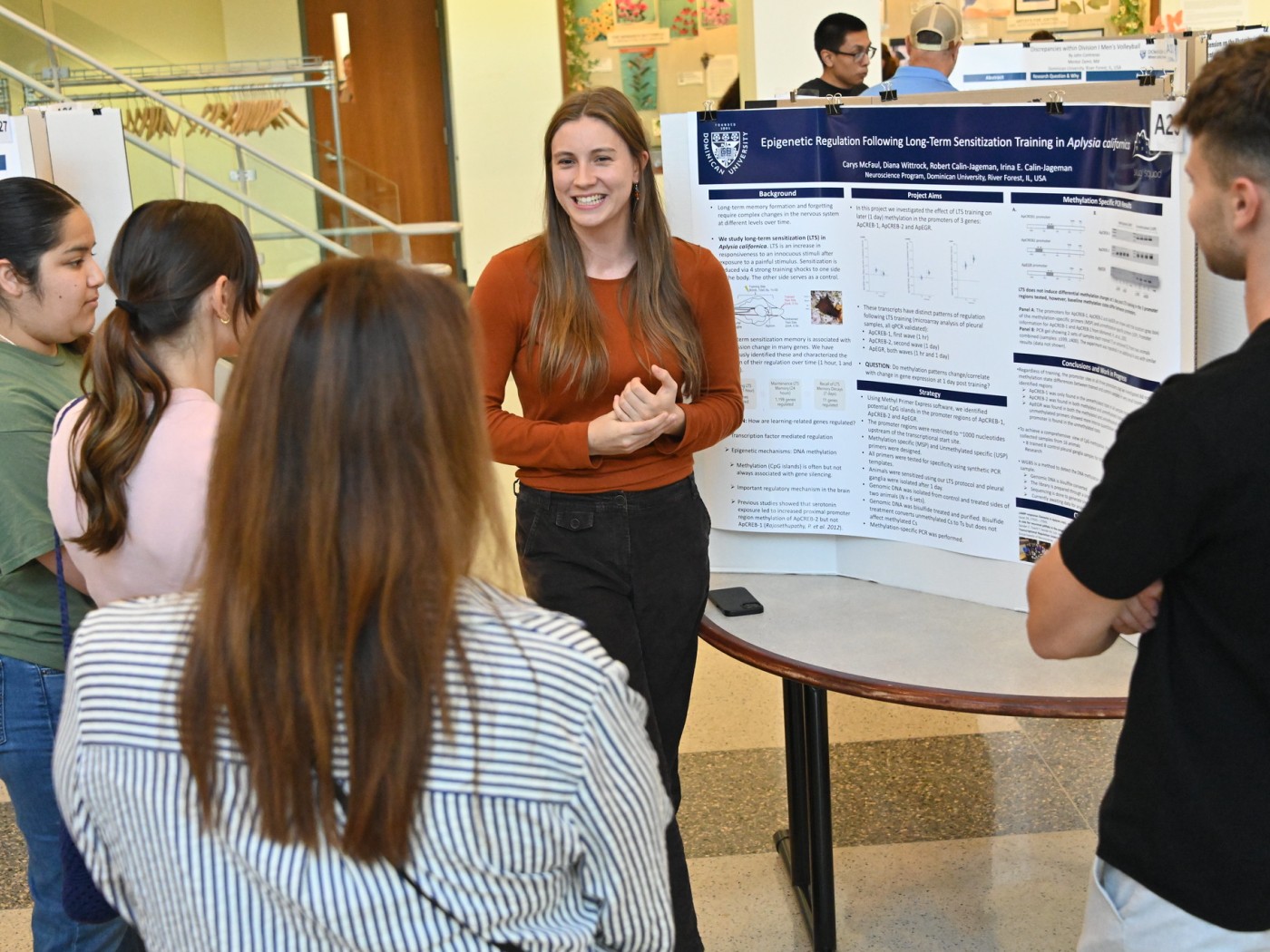 Student at display board at Expo